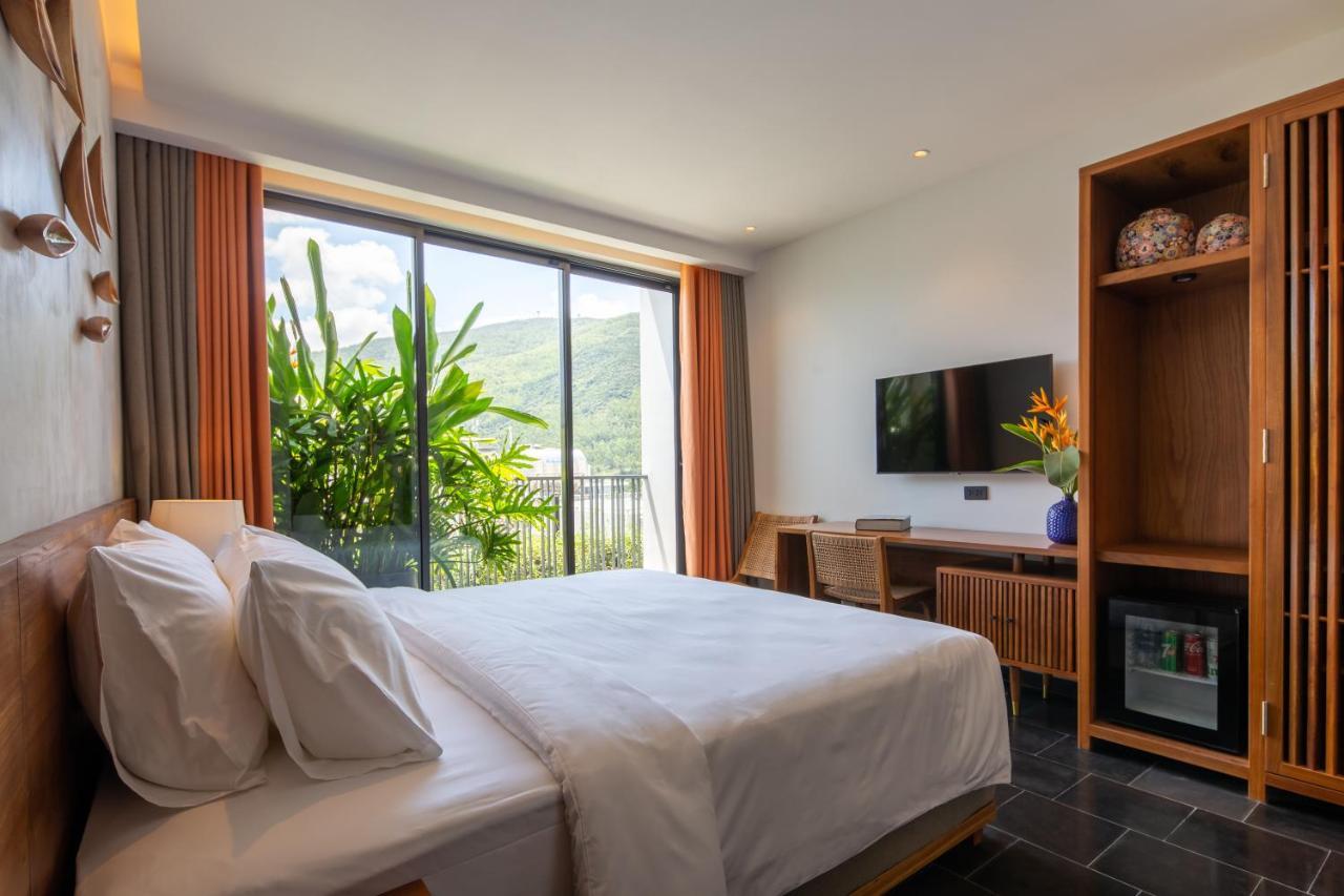 Le Mint Hotel Куинён Экстерьер фото