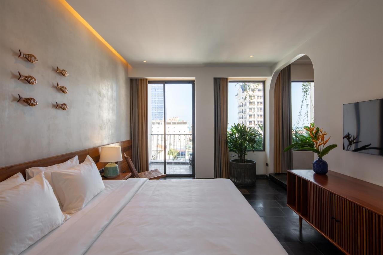 Le Mint Hotel Куинён Экстерьер фото