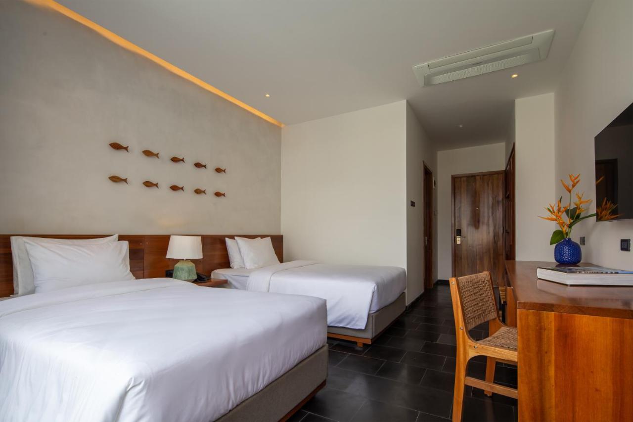 Le Mint Hotel Куинён Экстерьер фото