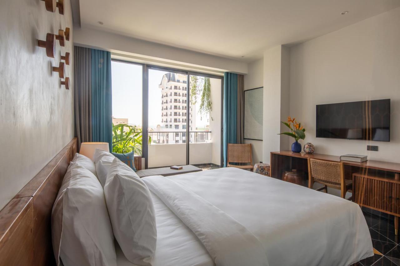 Le Mint Hotel Куинён Экстерьер фото
