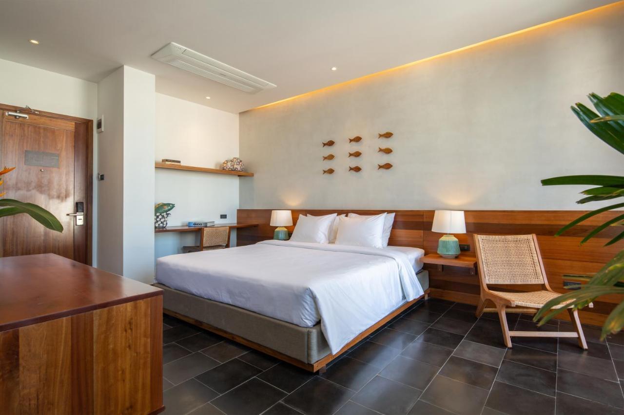 Le Mint Hotel Куинён Экстерьер фото