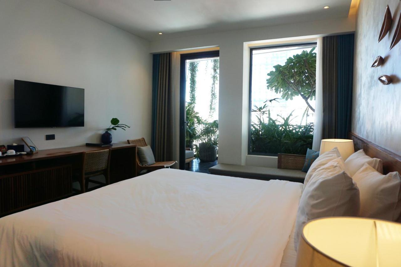 Le Mint Hotel Куинён Экстерьер фото