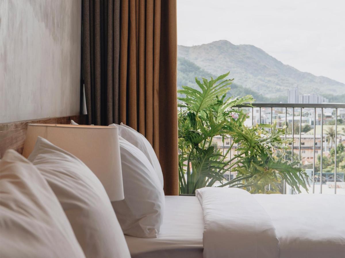Le Mint Hotel Куинён Экстерьер фото