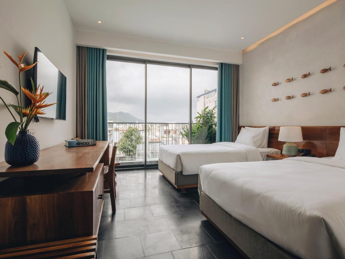 Le Mint Hotel Куинён Экстерьер фото