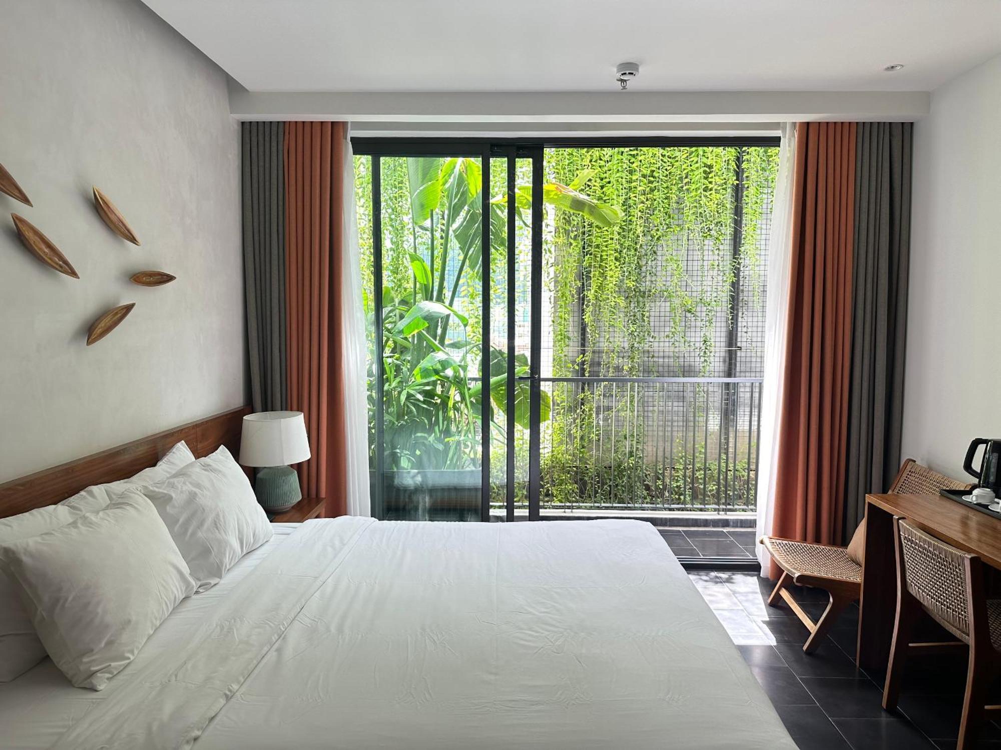 Le Mint Hotel Куинён Экстерьер фото
